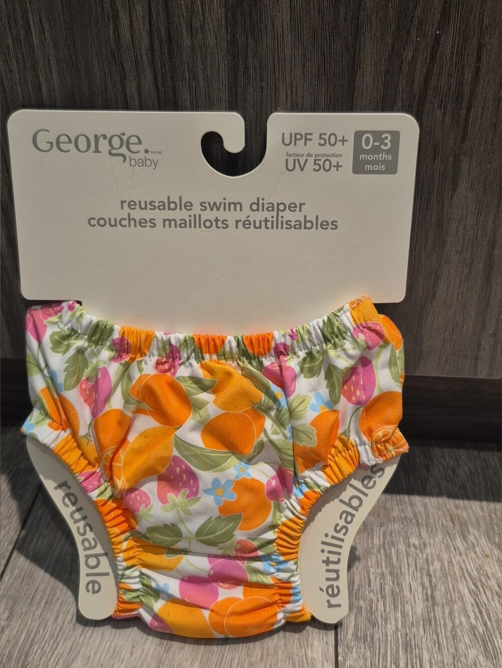 George Baby Orange Floral Reusable Swim Diaper With UPF 50+ Rating Protection